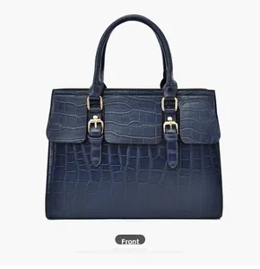 Front view of a navy blue handbag with crocodile texture and gold hardware accents