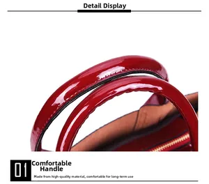 Detail of comfortable rounded handle on glossy wine red snakeskin texture handbag