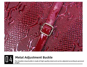 Detail of red faux snake skin texture with premium adjustable gold metal buckle