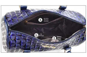 Interior view of boston bag with geometric pattern, zipper pocket and compartments