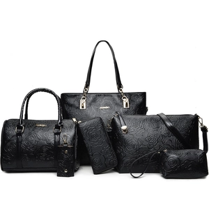 Black 6-piece handbag set with embossed rose texture including tote and crossbody bags