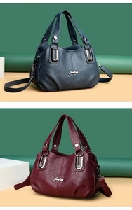 Detail view of large capacity faux leather tote bags in navy blue and burgundy wine red