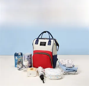 Detailed view of spacious interior compartments for diapers, bottles, and baby essentials