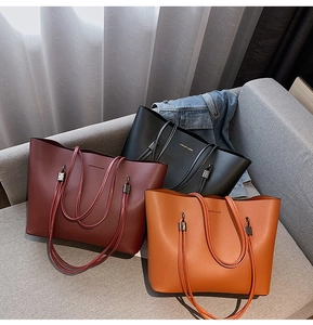 Three-color minimalist tote bag set in burgundy black and brown with metal buckles