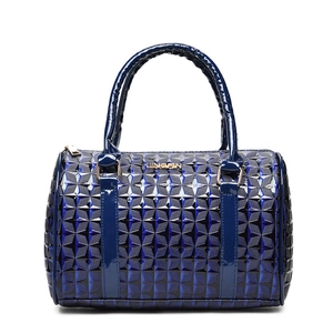 Navy blue Boston handbag with geometric star texture and gold metallic handles