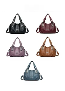 Detailed close-up showing five color variants of the large vintage faux leather tote bag
