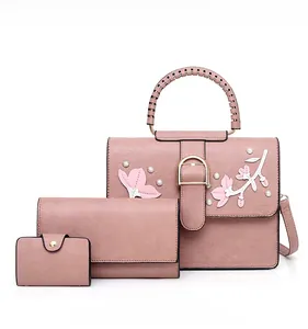 Pink 3-piece bag set with floral embroidery, pearl accents and woven handles