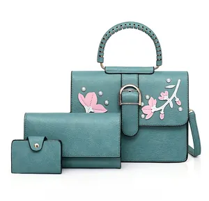 Lake blue 3-piece handbag set with floral applique, faux pearls and woven handles