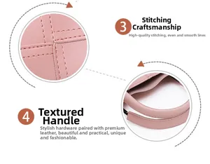 Detailed view of pink leather handbag stitching and handle craftsmanship on white background
