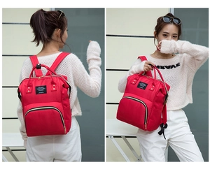 Red multi-use backpack shown in hand-carry and shoulder-wear styles for daily travel