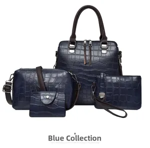 Détail de l'ensemble de sacs à main bleus en cuir crocodile avec cabas et sacoche