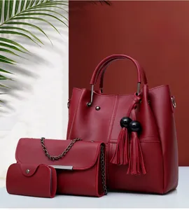 Detailed set of wine red faux leather tote with tassel and chain crossbody bags