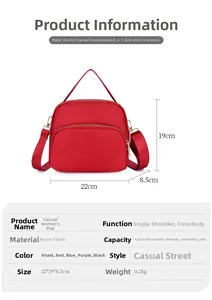 Detailed dimension chart for a red nylon crossbody bag showing 22x19x8.5cm size specs