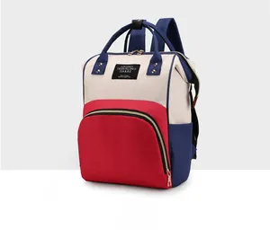 Micro side view of the tricolor patchwork backpack with large front zipper pocket