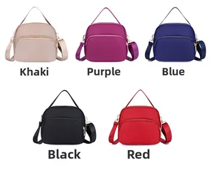 Collection of waterproof oxford shoulder bags in khaki, purple, blue, black, and red colors