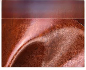 Detailed macro view of caramel patent leather texture with natural glossy finish