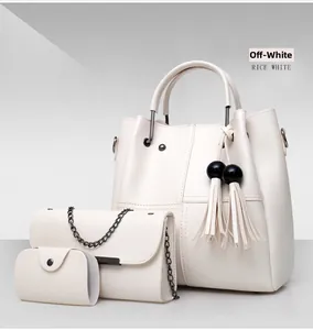 Detailed set of three rice white faux leather bags including tote, crossbody, and clutch