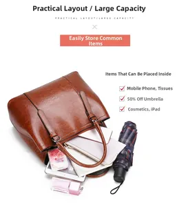 Spacious interior of brown faux leather tote bag showing large storage capacity