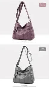 Dettaglio di borse a tracolla in pelle viola e grigia con design a tasche multiple con zip
