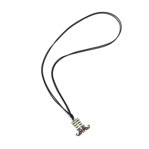 Halloween witch boot pendant necklace with green stripes and purple polka dots on black cord
