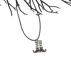Halloween witch boots pendant necklace with purple dots and green stripes on black cord