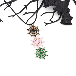 Gothic Halloween necklace with three colorful spider web pendants on a black cord
