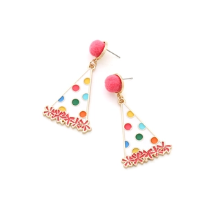 Detail of party hat earring with colorful polka dots, enamel finish and pink pompom