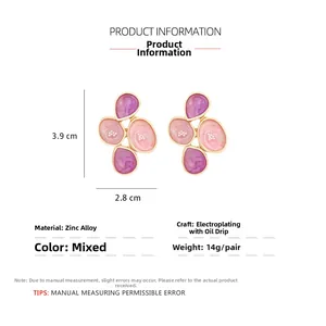 Detail view of pink and purple enamel petal earrings with dimensions and specifications