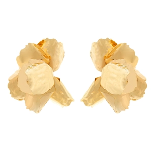 Macro detail of retro large gold flower earrings with textured 3D metallic petals