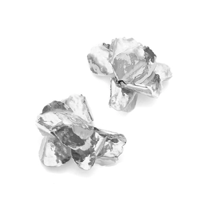 Detailed view of silver textured 3D flower earrings with artistic hammered finish petals