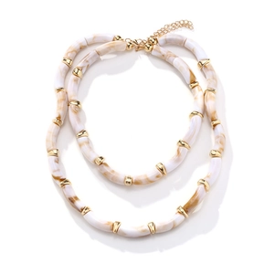 Layered chunky resin necklace with marble texture beads and golden metal accents