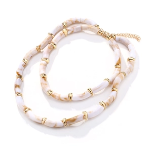 Chunky layered beaded necklace with marble-patterned resin and gold metal spacers