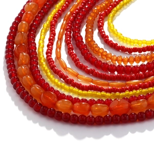 Bohemian multilayer beaded necklace set with warm red and orange tiered beads