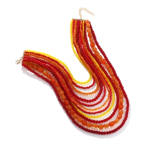Bohemian multi-layer beaded necklace featuring warm red orange yellow tones and gold clasp