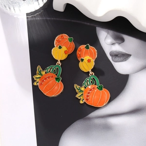 Fashionable Halloween pumpkin earrings with colorful enamel and orange crystal drops