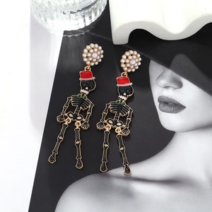 Gothic skull earrings with black enamel, red hat, and white pearls for Halloween