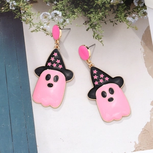 Detail of pink ghost earrings with black witch hats and gold metal enamel finish