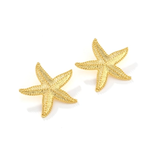 Macro shot of gold starfish earrings featuring realistic grainy texture and metallic finish