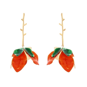 Luxurious layered gold floral earrings with red and green enamel petal drops