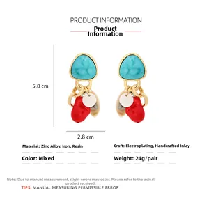 Detail showing 5.8x2.8cm retro ethnic earrings with turquoise and colorful resin drops
