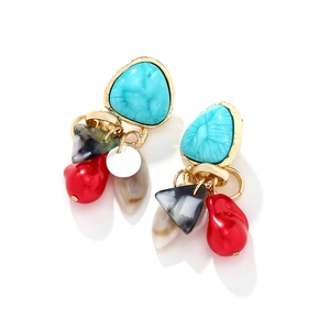 Bohemian drop earrings featuring turquoise stones with vibrant tassels and shells