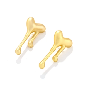 Matte gold molten heart earrings featuring artistic fluid design and abstract metal texture