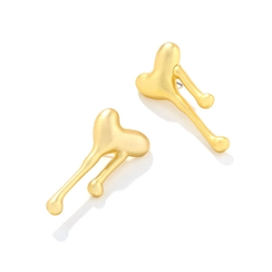 Exaggerated irregular matte gold heart earrings with liquid molten metal texture