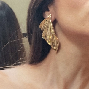 Vintage textured golden leaf earrings with irregular metallic foil pattern for women