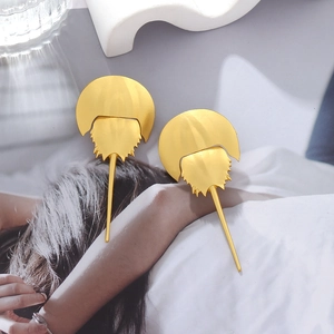 Retro golden horseshoe crab hairpins with metallic texture for a unique ocean style