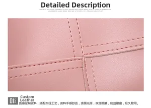 Detailed macro shot of pink textured leather with precise double stitching on the handbag