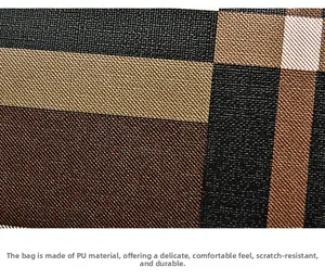 Detailed macro view of classic plaid PU leather texture with scratch-resistant surface
