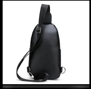 Close-up of black crocodile grain texture on men crossbody bag with adjustable strap