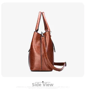 Side view of large capacity glossy patent leather tote bag in caramel brown with silver hardware