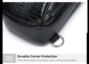 Detail of durable corner design on black crocodile embossed leather crossbody bag
